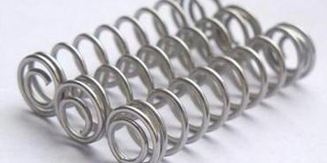 彈簧機生產時彈簧外徑如何調整?